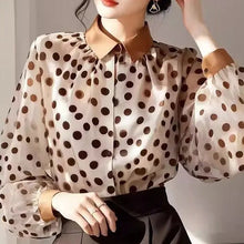 Load image into Gallery viewer, Woman wearing a polka dot blouse with a neutral background