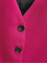 Load image into Gallery viewer, Close-up of a pink garment with buttons