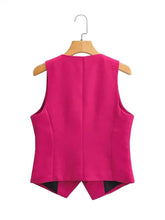 Load image into Gallery viewer, Pink vest on a hanger